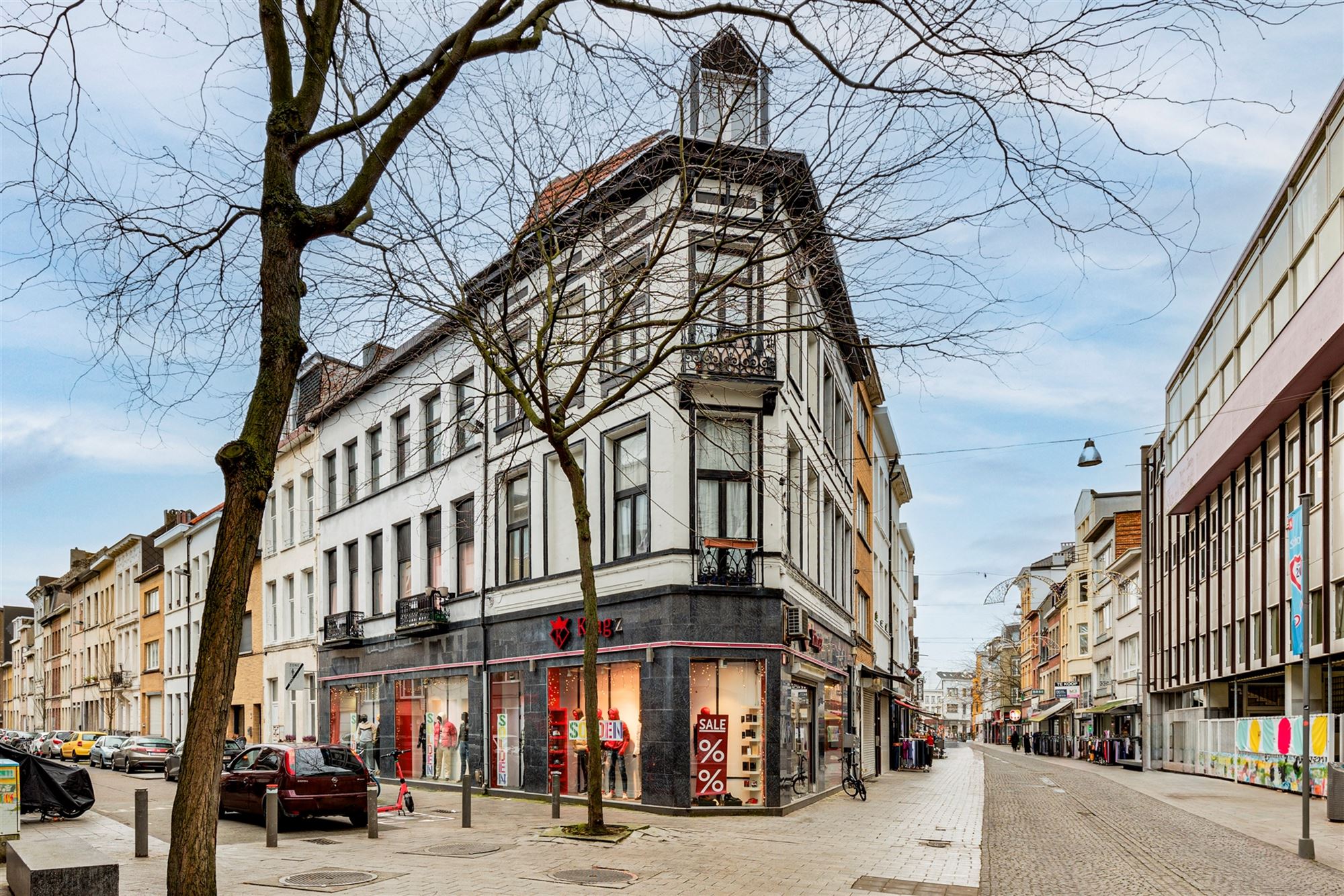 Hoekpand bestaande uit handelsglvl + 6 appartementen - foto 2