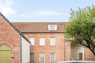 Exclusive living in peace and quiet, just a stone's throw from Hasselt.<br /><br />For those who appreciate space, privacy, and high-quality finishes, this is a special apartment in a sought-after location on the outskirts of Hasselt. Quiet and residential living goes hand in hand with excellent accessibility: the bustling city center is just a few kilometers away, while schools, childcare, shops, entertainment, and daily amenities are easily accessible on foot or by bike.<br /><br />With a living area of a generous 184 m² (source EPC), this apartment feels more like a full-fledged home. The spacious living area is the heart of the space and has been stylishly finished with parquet flooring, a gas fireplace, and a custom-made TV cabinet. Adjacent to this is a separate office space with built-in cabinets – ideal for those who want to comfortably work from home.<br /><br />The open kitchen seamlessly connects to the living area and maintains the same classy style. Large windows provide a pleasant connection to the terrace and the greenery outside, creating a natural flow between indoors and outdoors.<br /><br />Upstairs, there are three full-sized rooms. The bathroom is equipped with both a bathtub and a spacious shower. Home automation, an alarm system, and a separate private entrance emphasize the comfort and exclusive nature of this property.<br /><br />Outside, quality of life has also been considered. A spacious terrace of approximately 16.5 m² overlooks the communal garden, where a swimming pool and play area provide almost a residential holiday feel. A rare combination of privacy and shared facilities, without the maintenance of a traditional villa.<br /><br />Practically, this apartment is exceptionally complete: two parking spaces with charging facilities and two extra-large storage rooms complete the picture.<br /><br />According to the available energy performance certificate, the apartment has 184 m² (source EPC) of usable floor space and an energy score of 188 kWh/(m² year), earning it an energy label of B.<br /><br />This property is for those who are not just looking for an apartment, but for generous and discreet living with the convenience of the city within reach.