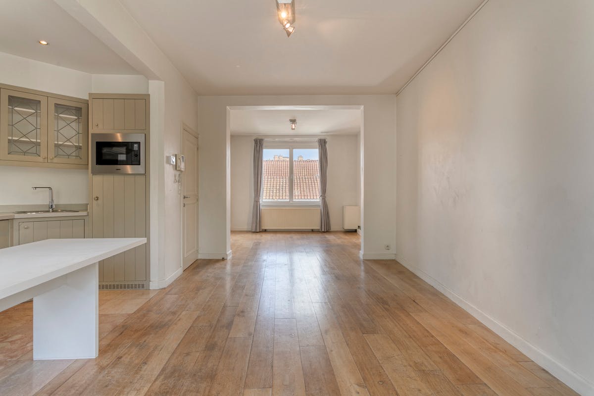 Premier étage de deux chambres à vendre sur la place du Dam à Courtrai ! - photo 5