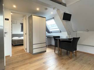 SEND US YOUR CLEE PROFILE VIA OUR WEBSITE WWW.ABRICASA.BEFurnished apartment, centrally located on the Grote Markt, near the shopping streets, cozy bars and restaurants.Suitable for co-housing because of the 2 bathrooms and mezzanine that can serve as an extra bedroom. Located on the 3rd floor in a small-scale building. Accessible by stairs.The apartment has just been refreshed, while the authentic elements have been preserved. The living room has an open kitchen with a view of the Cathedral.Through the living room you have access to the first bathroom and the mezzanine. The master bedroom also has an en-suite bathroom.There is no connection for a washing machine but there is a launderette over the door.- FURNISHED- EPC: 1227 kWh/m² UC: 2388867- Monthly costs: 25 euros include: Maintenance (cleaning 2x/month) and consumption avg. parts- Rental deposit: 2,700 euros (3 months rent)- Available: immediately- Contract type: Fixed term (1 year - renewable)- Address: Oude Bourse 25 - 2000 ANTWERPDo you wish to sell your house, apartment, building plot or investment property? Looking for a real estate agent for the rental or management of your property(s)?Abricasa stands for personal and active real estate assistance from A to Z! Get to know us!Call us for a no-obligation appointment on 03 259 04 04.