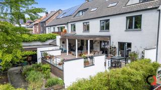 Exclusief gelijkvloers appartement met privatieve tuin, ruim terras en ondergrondse polyvalente ruimte nabij centrum GenkOp een absolute toplocatie...