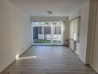 GEZELLIG GELIJKVLOERSAPPARTEMENT MET 1 SLAAPKAMER, GROOT ZUID-GEORIËNTEERD TERRAS 19M² EN GARAGE.rustige ligging nabij centrum met vlotte...