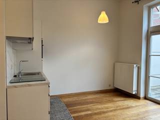 Op zoek naar een gelijkvloers appartement met tuin en terras? Dan is dit 1-slaapkamerappartement in het centrum van Leuven zeker een bezoek...