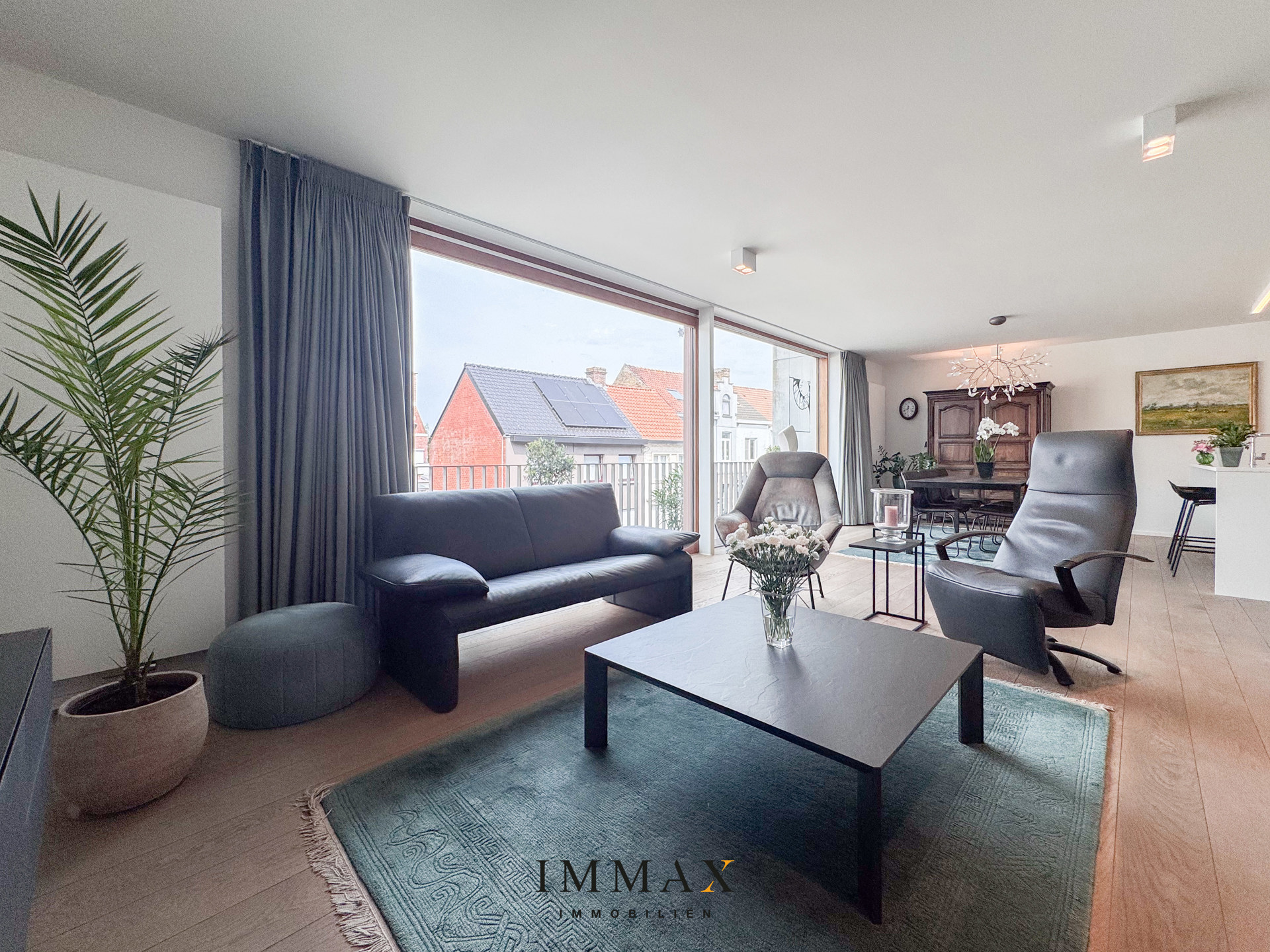 Ruim en lichtrijk 2-slaapkamerappartement met zonnig terras in hartje Sint-Michiels - foto 4