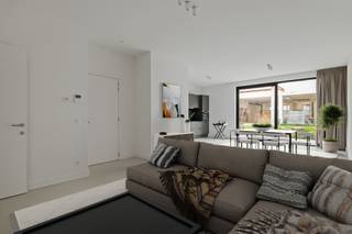 This modern apartment in Mortsel offers a perfect combination of comfort, style and functionality on a usable area of 97m². It features two spacious bedrooms and a fully equipped bathroom, ideal for families or professionals.The open living space features large windows that allow ample natural light and provide a direct connection to the outdoor area. The modern kitchen unit with gray cabinets and black countertops is fully integrated and equipped with contemporary appliances. The clear floors and sleek architecture create a serene and inviting atmosphere.A striking feature is the generous sliding doors that provide direct access to the private garden, perfect for enjoying outdoor space and fresh air. The home also features practical storage space and a thoughtful layout that ensures efficient use of available space.High-quality finishes, modern design and optimal space distribution make this apartment an attractive choice for those looking for a contemporary place to live in Mortsel. The location in this growing municipality also offers good accessibility to amenities and traffic routes.