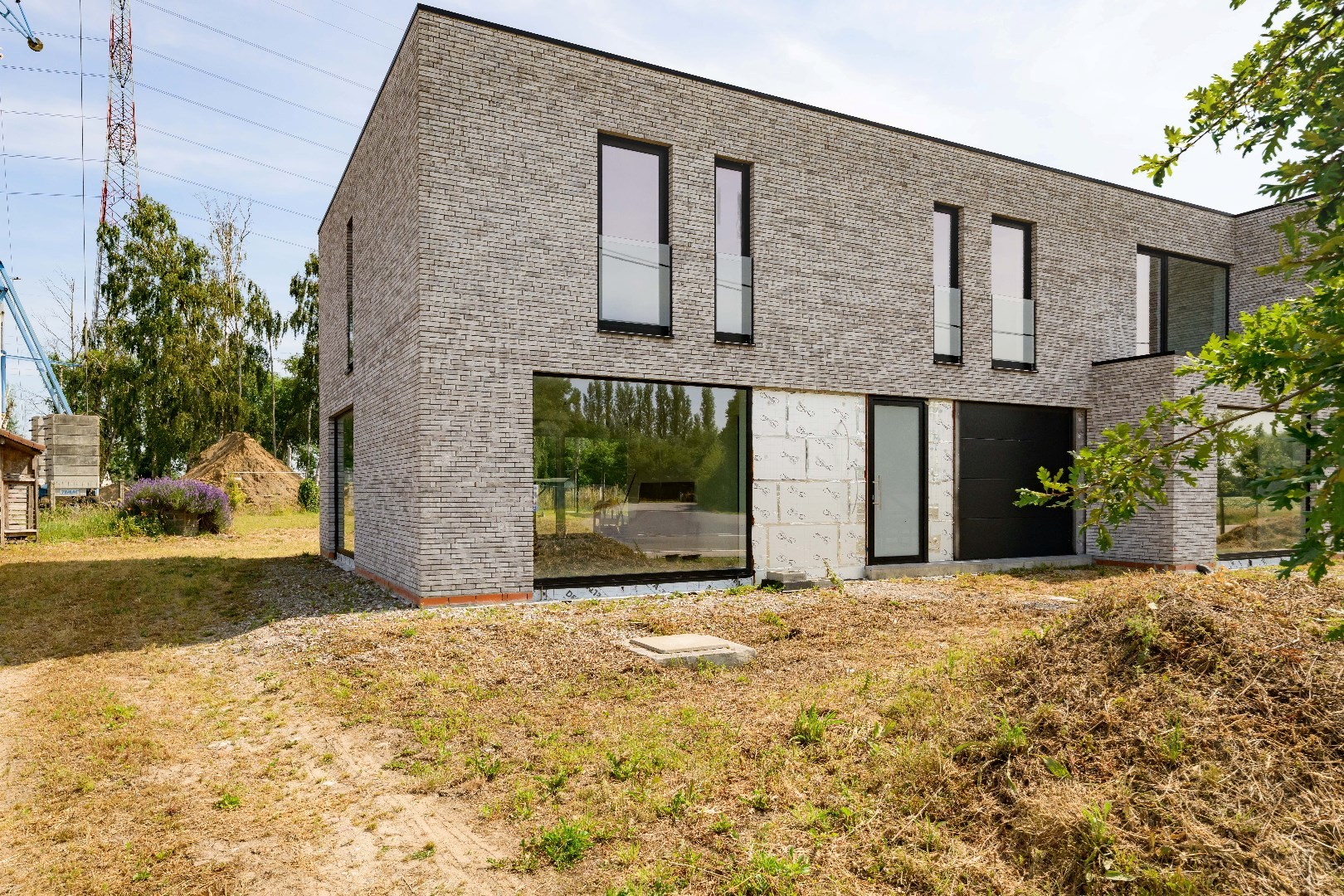 PRACHTIGE MODERNE WONING MET TUIN | GARAGE EN BIJGEBOUW (24 m²) - foto 3