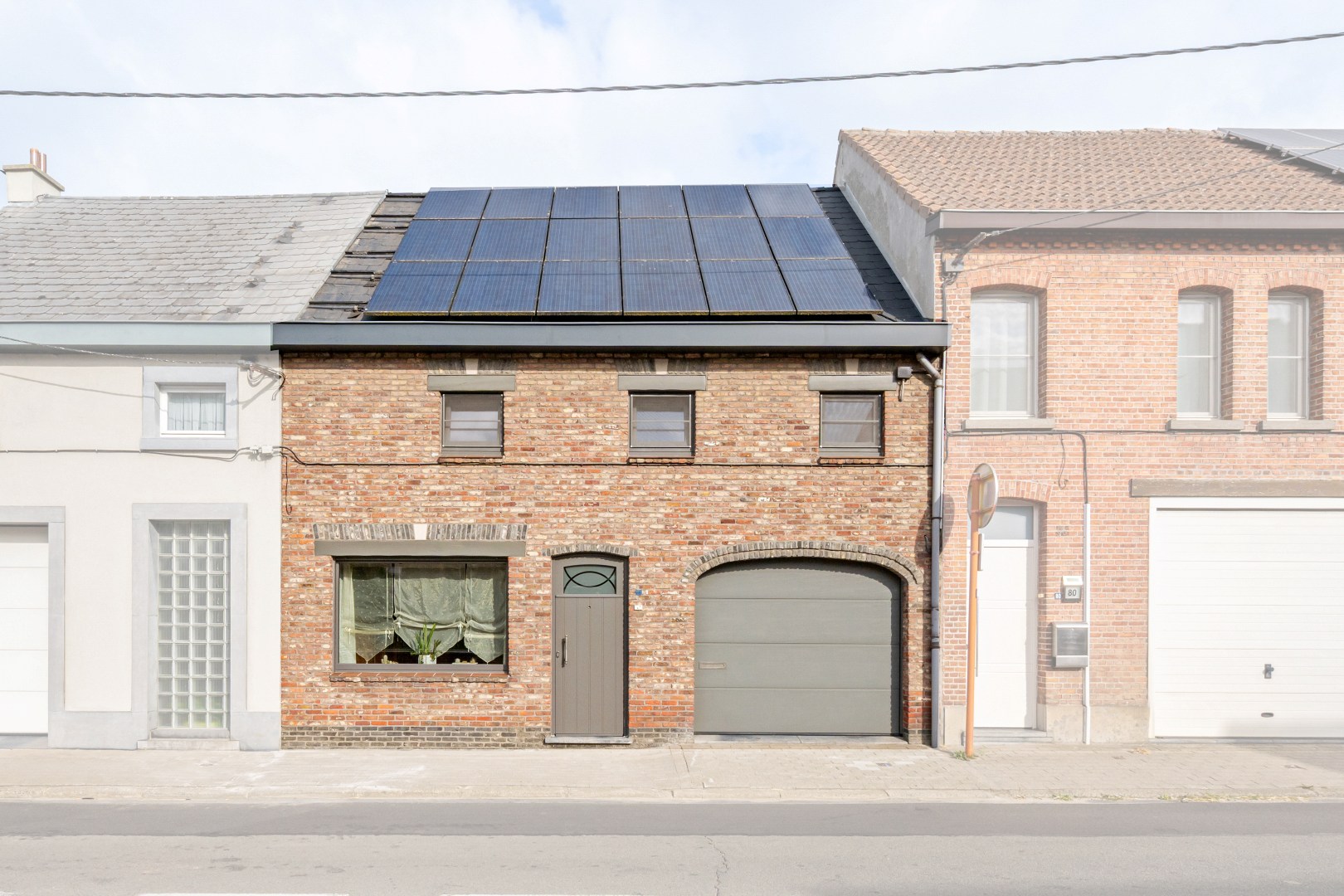 Woning met garage en zonnige tuin. - foto 1