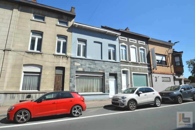 Te renoveren tweegevelwoning met achterliggende loods (uitweg) - foto 1