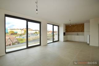Prachtig gelegen nieuwbouwappartement in het centrum van Ronse, Sint-Ambrosiusstraat 20. Dit appartement (80m2) met terras (14,50m2) is gelegen op de...