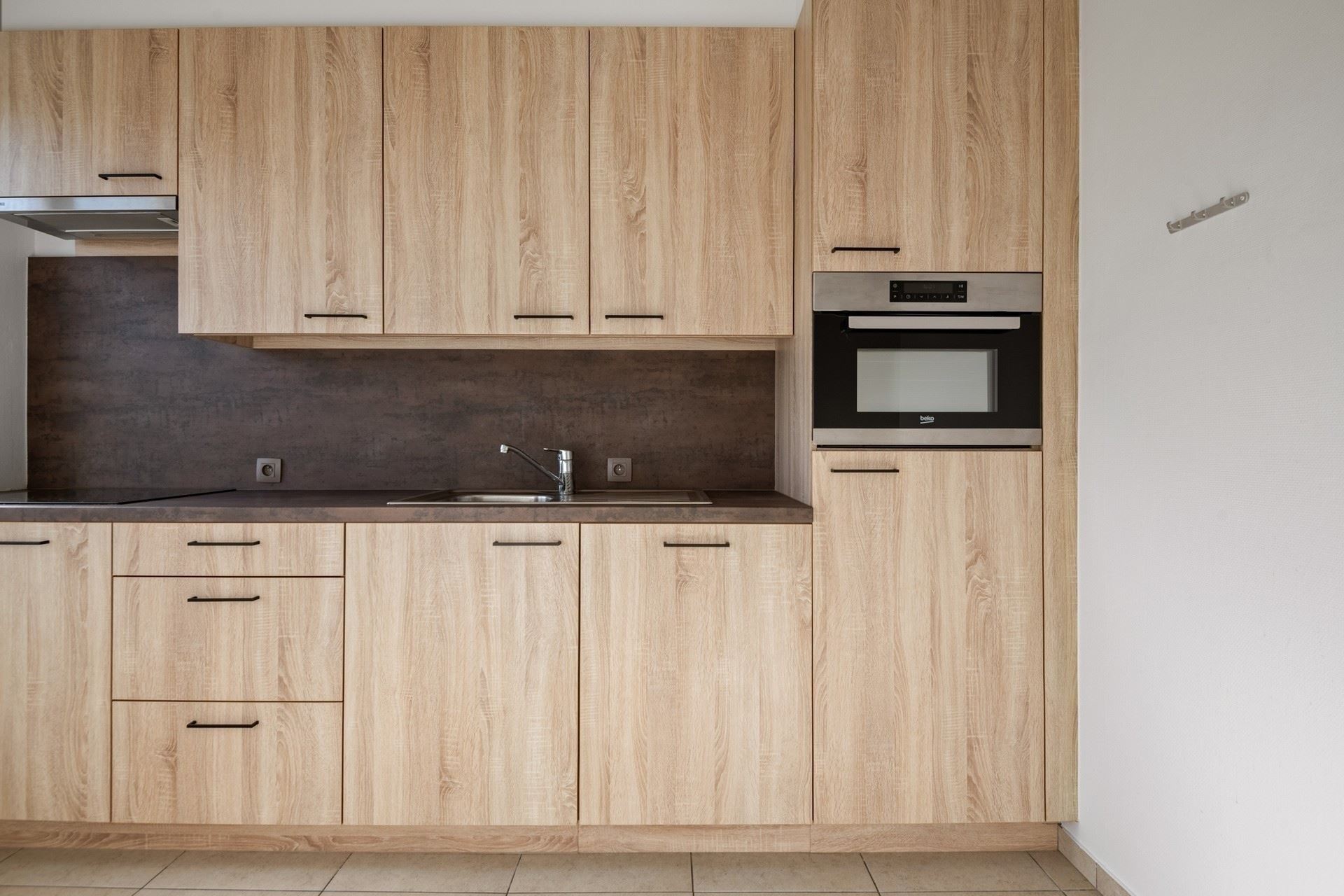 Centraal gelegen en instapklaar appartement met garagebox. - foto 4