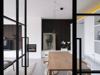 Omgeving Sint-Pietersstation. Stijlvol en architecturaal gerenoveerd appartement met 2 volwaardige slaapkamers, privatieve staanplaats en een...