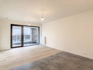 1-slaapkamerappartement te huur in de Parkdreef 25, op de site van Tour & Taxis.Het appartement beschikt over een inkomhal, een ruime woonkamer...