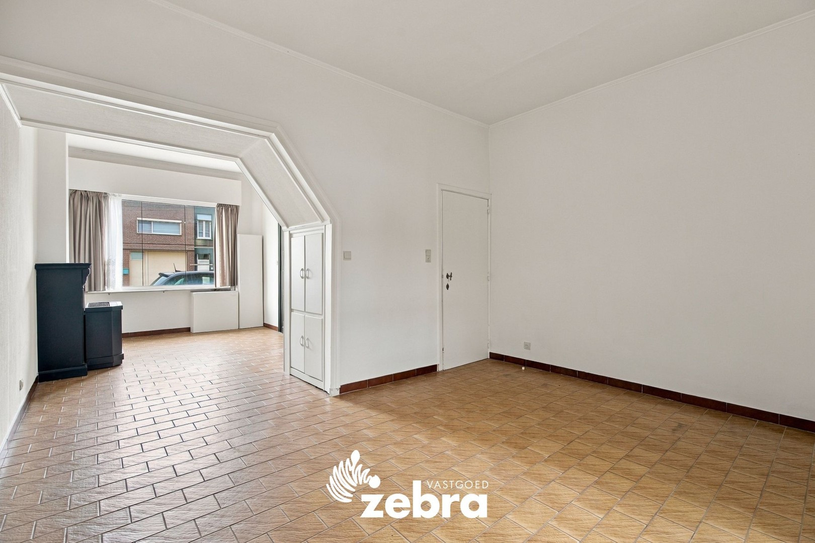 Te renoveren woning met uitweg te Roeselare! - foto 4