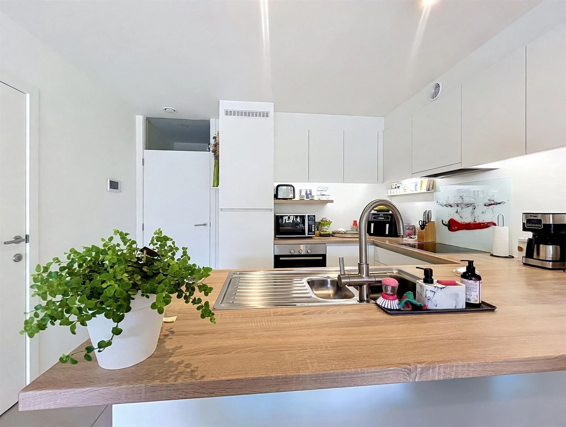 Gelijkvloersappartement met autostaanplaats - foto 5