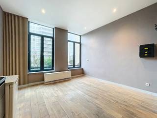 LIGGING:Deze studio is gelegen op de eerste verdieping van een kleinschalige residentie in het hart van Gent met uitzicht op het water. Het pand...