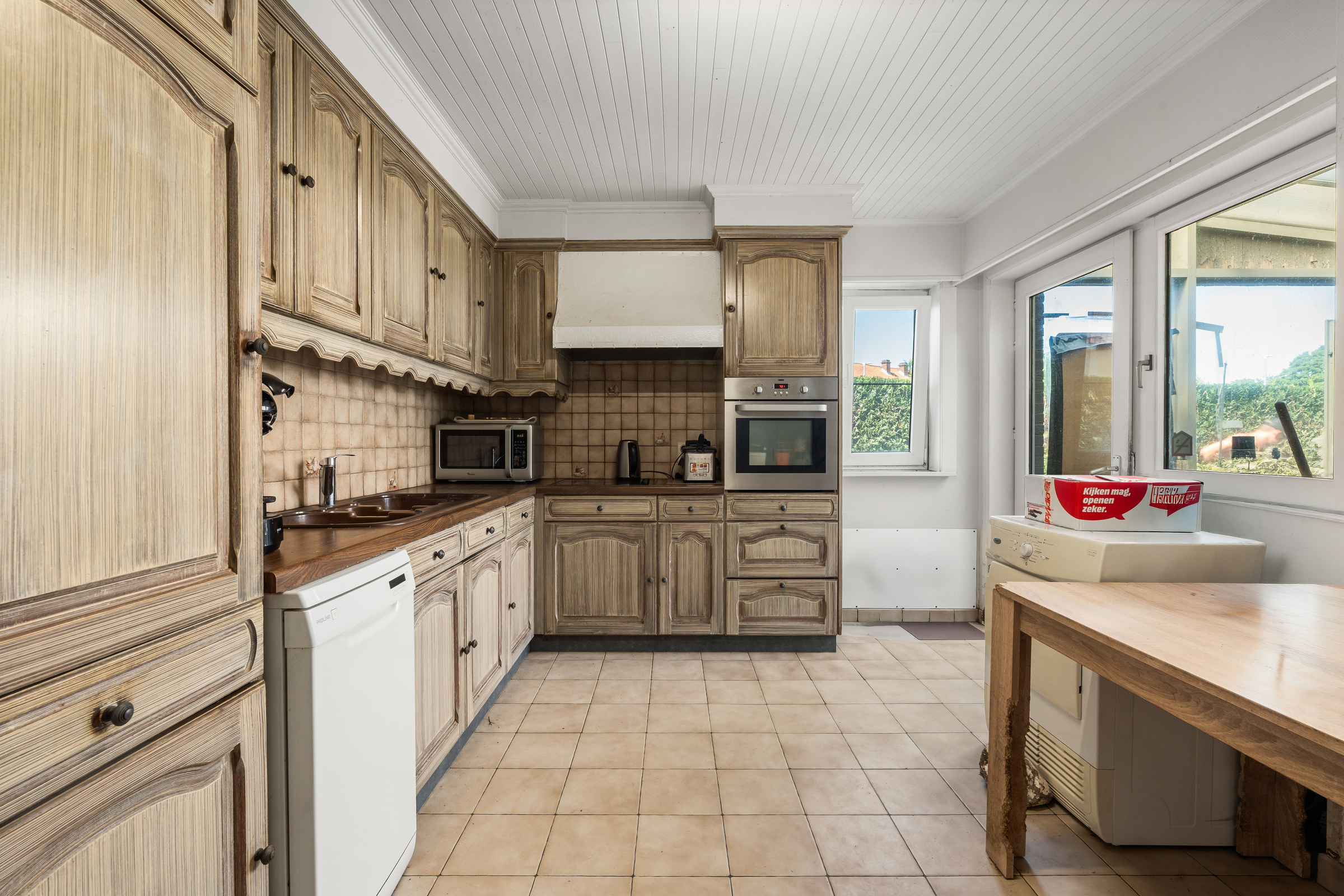 Halfopen woning met tuin en garage in Baasrode - foto 4