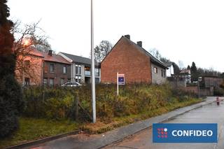 Rustig gelegen bouwgrond met volgende eigenschappen:` perceelgrootte van 3a 14ca (+/- 19,50m x 16m)` voor het realiseren van een halfopen bebouwing`...