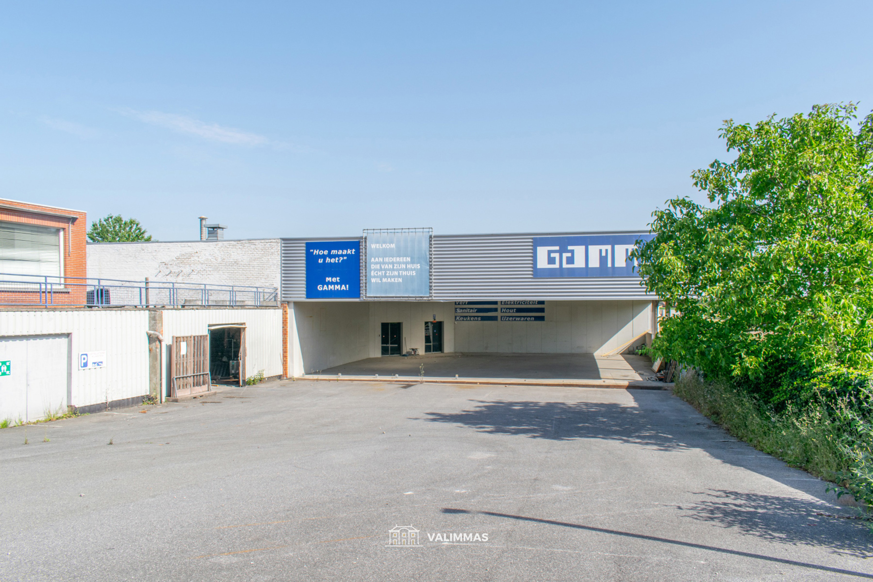 Handelsruimte/opslagplaats met parking (voormalige Gamma) - foto 1