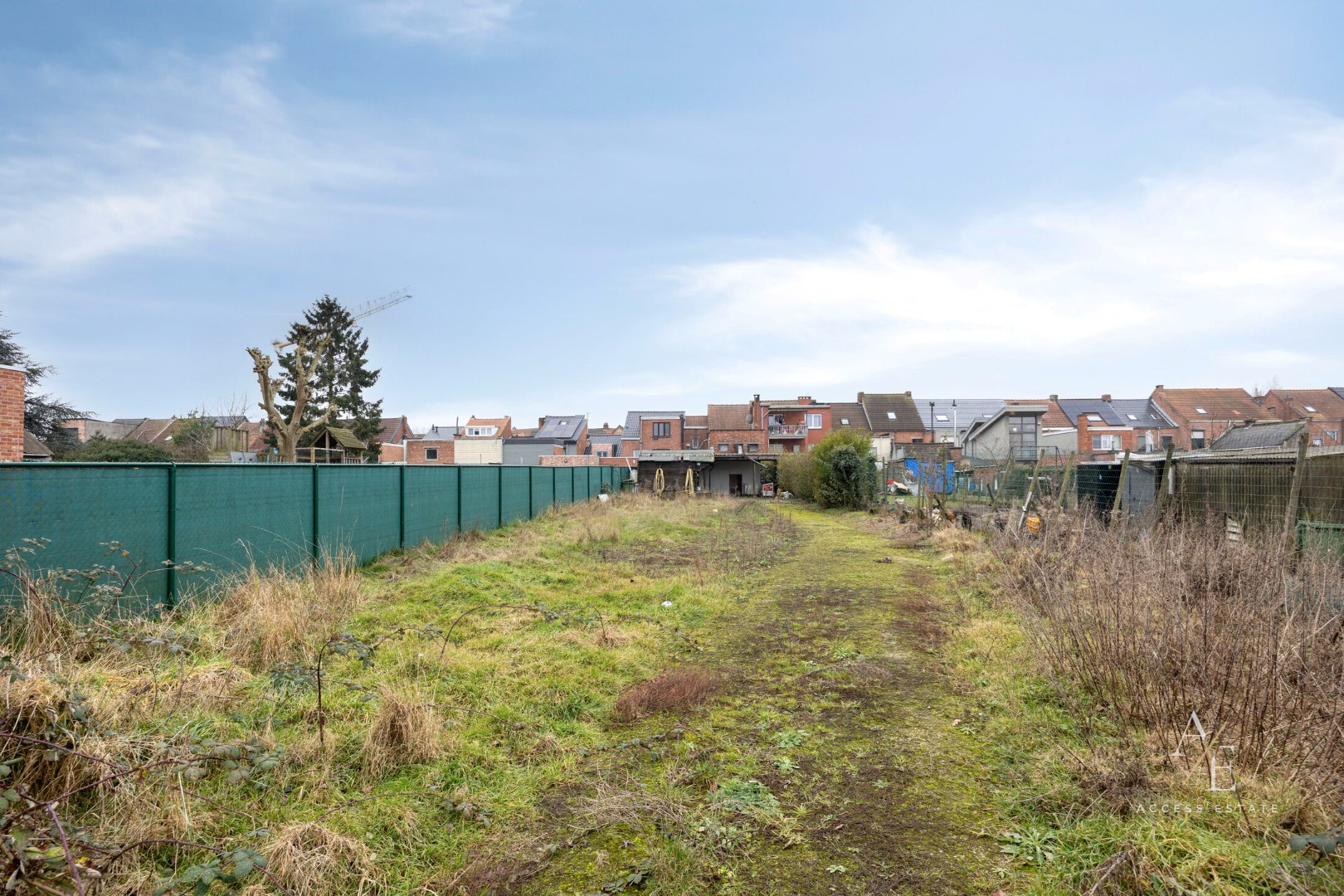 Veelzijdig te renoveren eigendom met tuin en 2 garages en achterdoorgang in Temse - foto 3