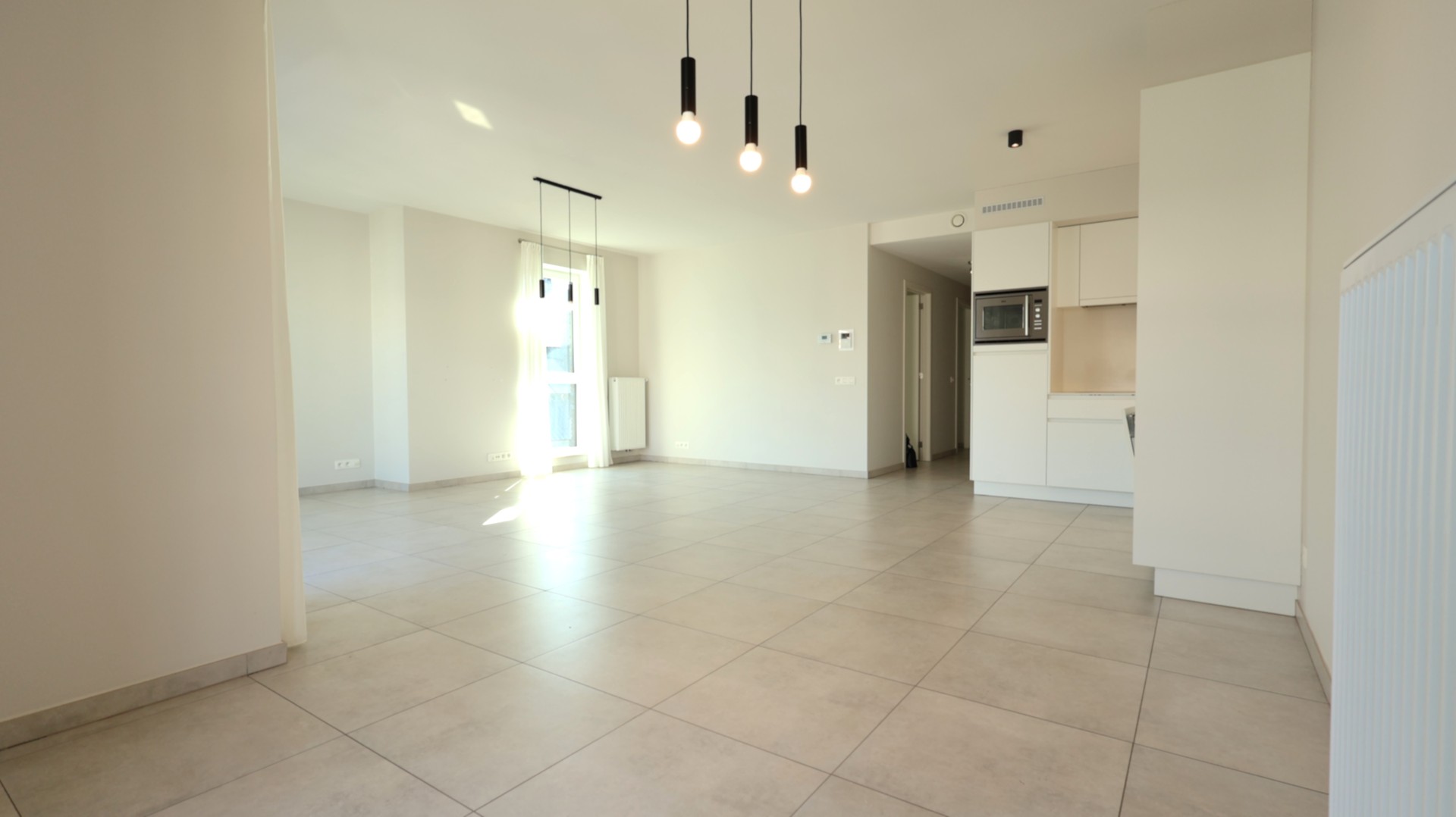 Modern en lichtrijk appartement in het hart van Roeselare - foto 4