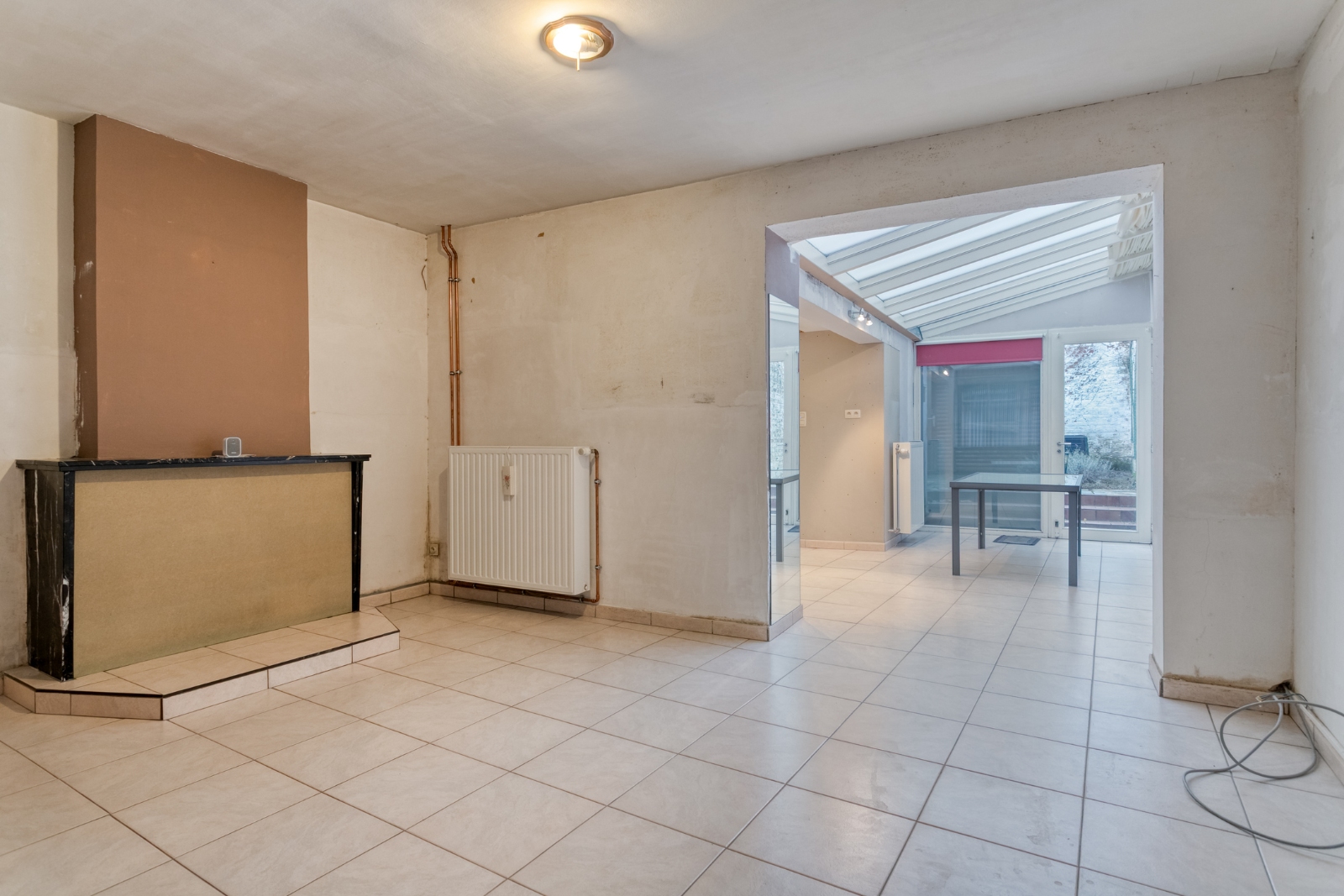 Verder op te knappen stadswoning met 3 slaapkamers en tuin - foto 5