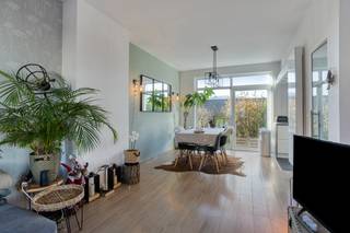 This charming semi-detached end-of-row home is peacefully located at the end of a quiet dead-end street. You enter the house from the side, where...