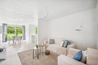 Deze moderne halfopen nieuwbouwwoning (rechts) is gelegen nabij het centrum van Booischot, dicht bij openbaar vervoer, scholen, supermarkten...