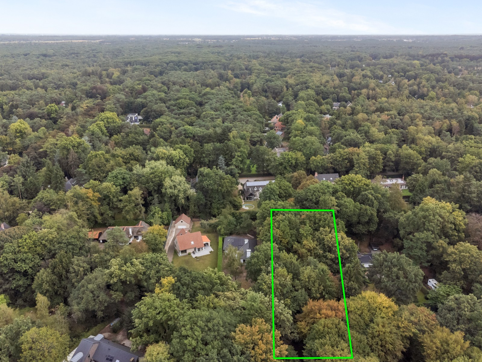 Bouwgrond van 2.231 m² in een oase van groen en rust - foto 1