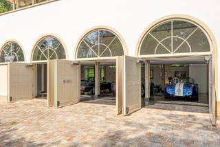 VILLANIVEAU -1Garage (voor minstens 4 wagens naast elkaar) | wijnkelder | technische ruimte.NIVEAU 0Polyvalente ruimte, momenteel ingericht als...