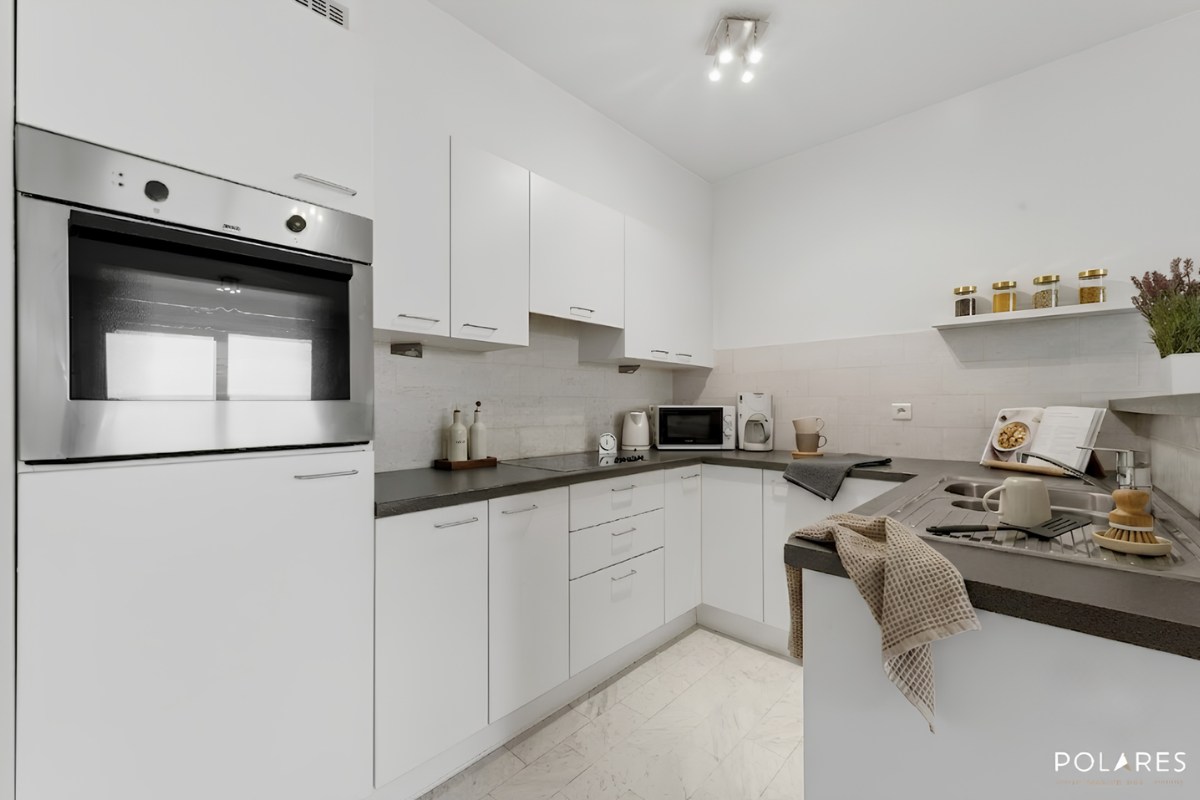 Goed gelegen appartement met terras én parkeerplaats! - foto 4