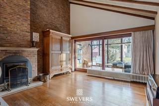 Interesse? Meer informatie op www.SWEVERS.be. - Deze open bebouwing in Kermt (Hasselt), gelegen in een rustige en kindvriendelijke buurt, biedt...