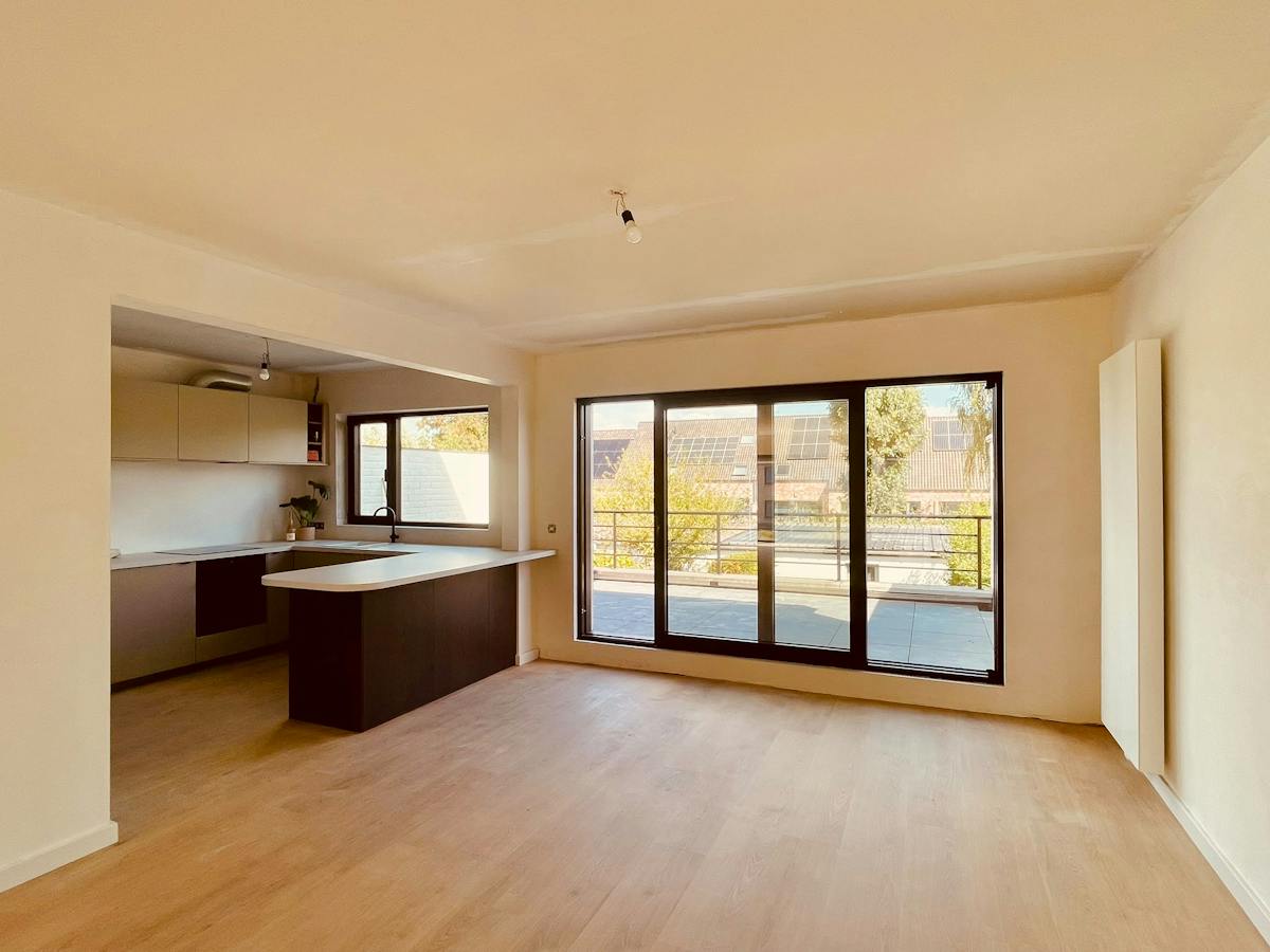 Vernieuwbouwappartement met 3 slaapkamers en garage - foto 3