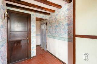 <p>Charming farmhouse in need of renovation with GREAT POTENTIAL, 2 garages, a driveway, and a lovely garden with an authentic brick oven! This characterful home (built in 1930) offers spacious rooms and plenty of possibilities for anyone looking for a charming renovation project.<br /><br />LAYOUT:<br />Ground Floor: entry hall, separate restroom, office, living and dining area with fireplace, kitchen (partially equipped), laundry room with shower, and double garage.<br />First Floor: night hall, 2 spacious bedrooms, potential to create a 3rd bedroom, separate toilet, and bathroom with a bathtub.<br />Outside: pleasant garden with an authentic brick oven, driveway with multiple parking spaces, stone garden shed. Attic available, currently used as storage space.<br /><br />What makes this property unique?<br />♦ Charming farmhouse with character – fireplace – 2 garages and parking spaces next to the house – lovely garden with authentic brick oven – stone garden shed – quiet location with good accessibility – ideal for those who appreciate space and authenticity.<br /><br />Who is this property ideal for?<br />♦ For renovation enthusiasts who want to redesign a farmhouse to suit their own taste.<br />♦ For families who want good accessibility but still prefer to live outside the city center.<br /><br />For sale through Immo Beguin, your real estate expert since 2009. With offices in Ronse, Waregem, Kortrijk, Deinze, Tournai, and Lessines.<br />✉️ info@immobeguin.be<br />📞 +32 486 60 66 00<br /><br />This ad contains AI-generated images.</p>