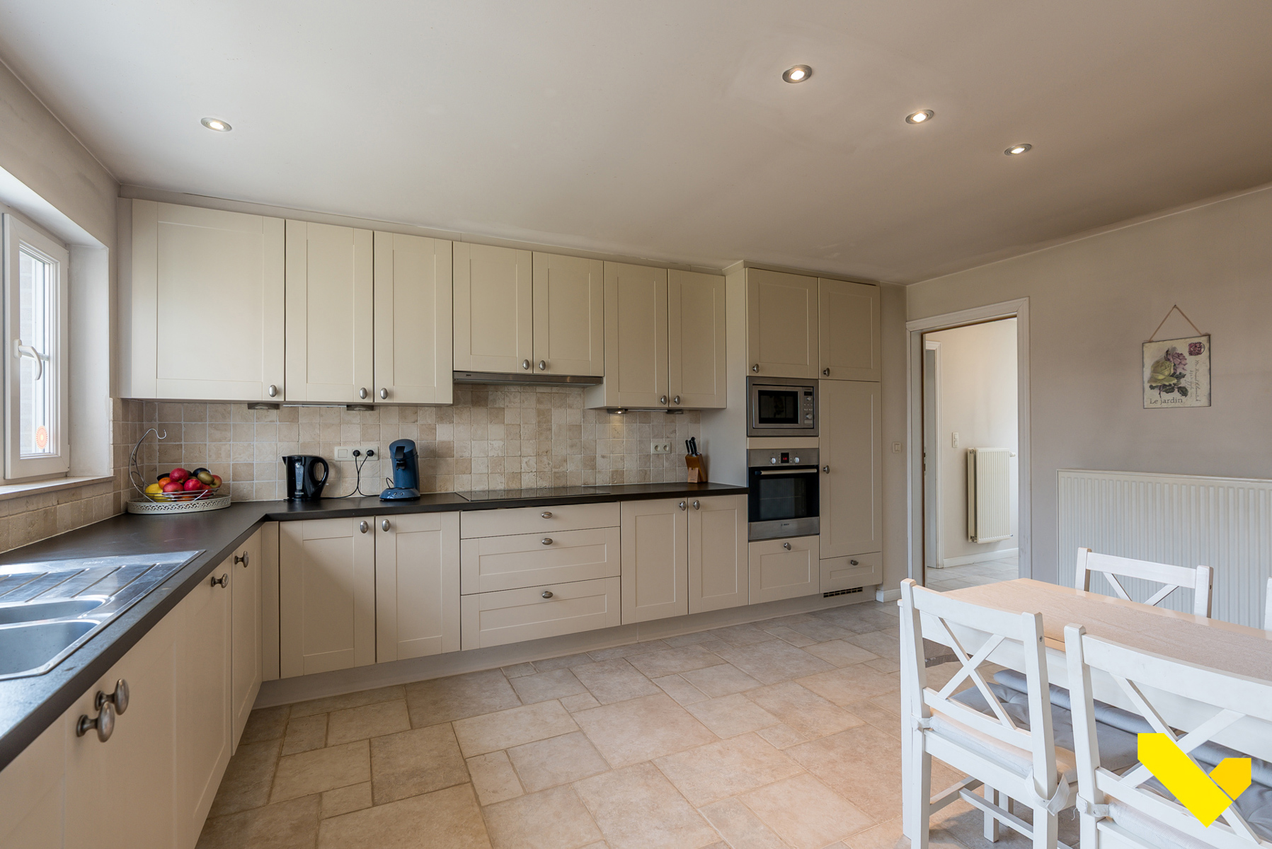 Gelijkvloerse woning met extra verdieping en ruime tuin. - foto 5