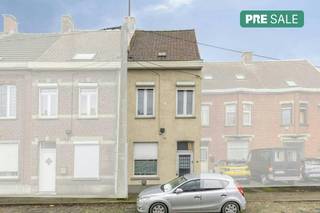 Welcome to this charming 1918 home, full of character and possibilities. With a living area of 138 m², this house offers a good basis for those looking for space, authenticity and future potential.The house currently has two full bedrooms. The spacious attic also offers many options and can be perfectly arranged as a third and even fourth bedroom, hobby room or home office.At the back, you can enjoy a spacious city garden, an absolute asset for those who like to spend time outside. Here you can relax, garden or get together with family and friends in peace and quiet.Extra advantages: the windows have already been renewed, the electrical installation has a compliant inspection and no renovation obligation applies. This provides extra peace of mind when purchasing.Thanks to its solid structure and authentic elements, this is the ideal home for those looking for a characterful home that can be further decorated or modernized to their own taste.Are you looking for a home with charm, space and expansion options? Then this building is definitely worth a visit!Layout of the house:Ground floor: - entrance with guest toilet- living room - dining room- kitchen - laundry room- bathroomFirst floor:- nighthall- 2 bedroomsSecond floor: - attic space with the possibility of a third and/or fourth bedroomHouse assets: - Located near the center of Roeselare- Possibility of 4 bedrooms- Nice city garden- Easy access to the center of Roeselare and access roads, E403, schools and public transport,...