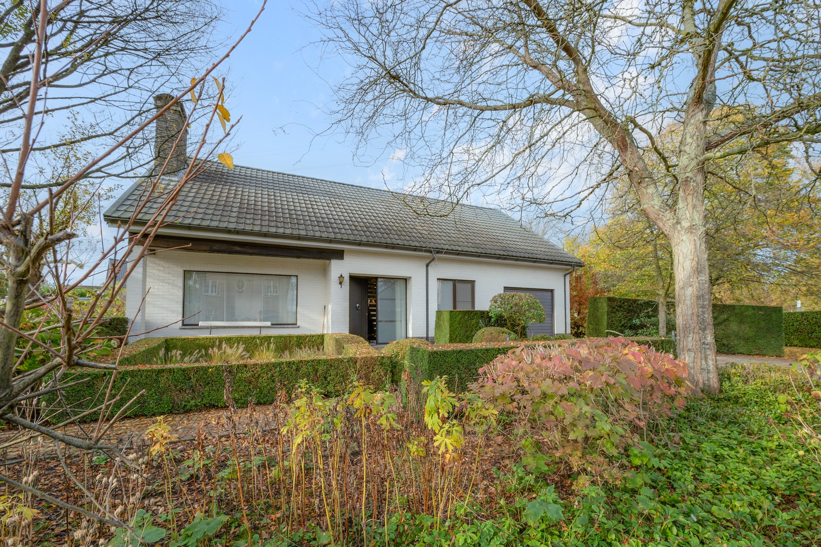 Uiterst verzorgde vrijstaande woning op ca 1070m2 met knap aangelegde tuin! - photo 2