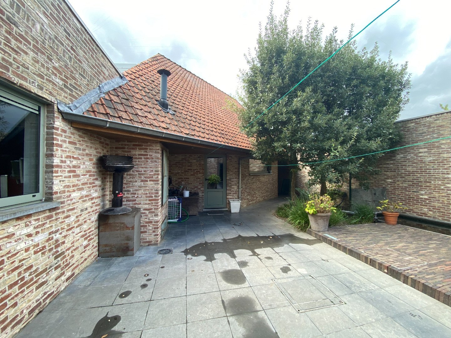 Multifunctioneel handelspand met luxueuze woonst op centrumligging in Sint-Eloois-Vijve! - foto 4