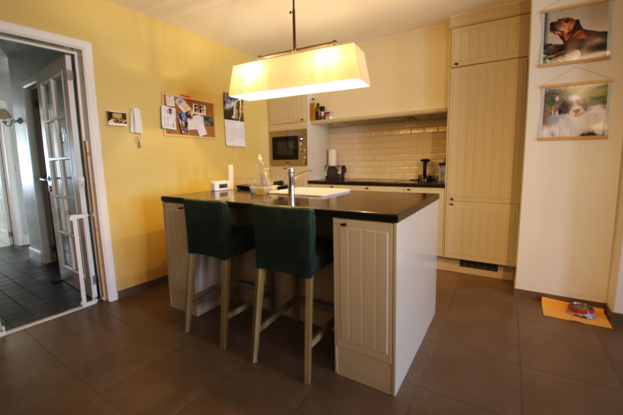 Luxueus gelijkvloers appartement met tuin en carport - foto 4