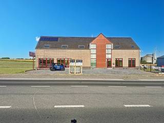 Havay — Immeuble mixte (±654 m²) avec parkings (avant et arrière pour minimum 15 véhicules), ascenseur et avec haute visibilité le long de la N6Vous...