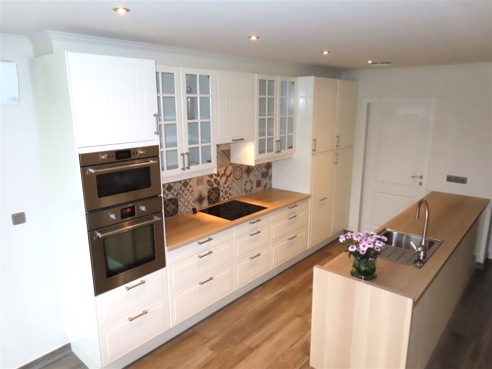 TE HUUR: Gesloten bebouwing met 4 slaapkamers in Koersel! - foto 4