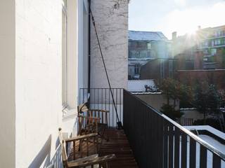Gerenoveerd tweeslaapkamerappartement met zonnig terras in een voormalige herenwoning, nabij het historisch centrum van Gent. Dit gerenoveerde...