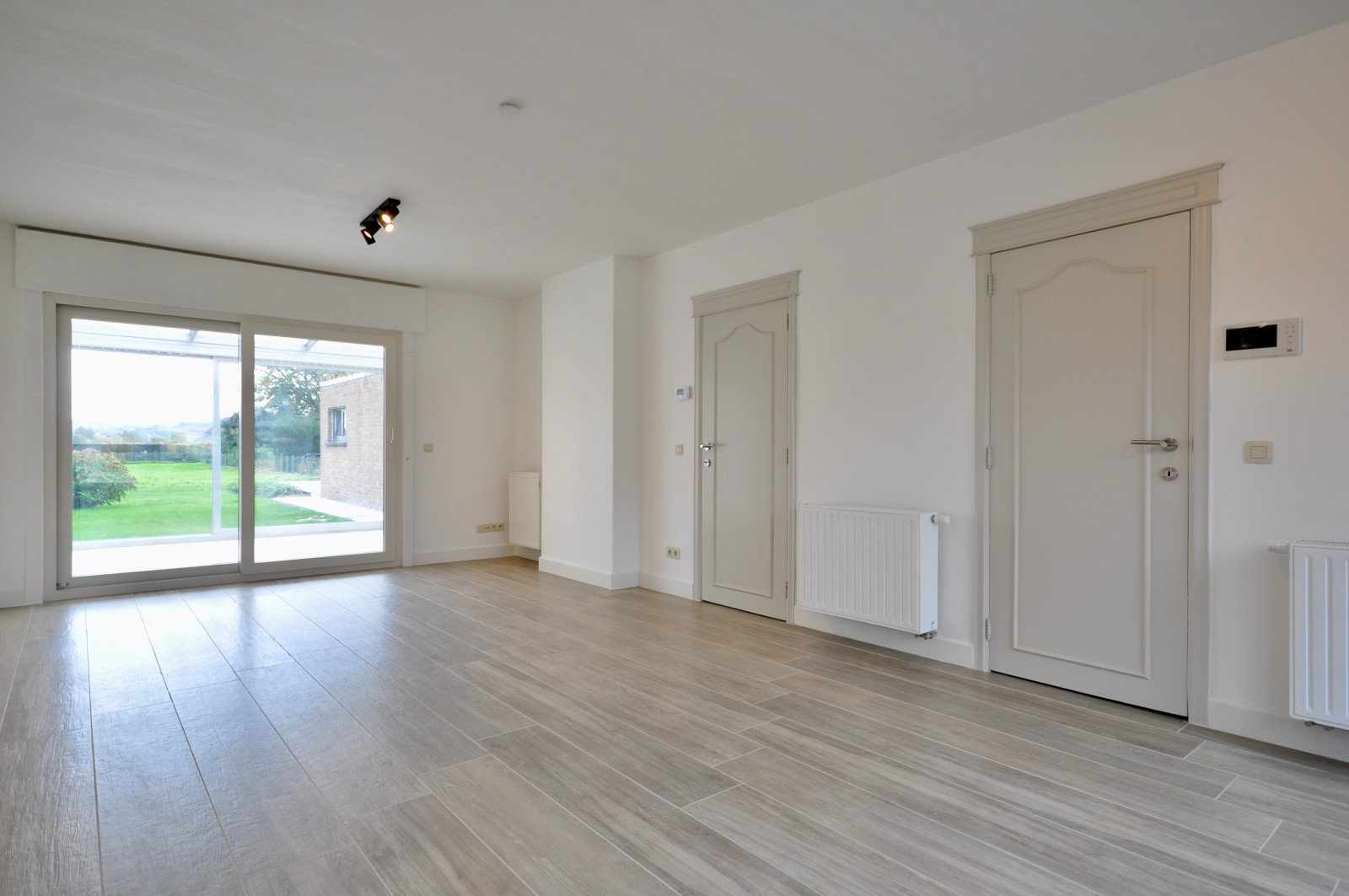 Instapklare halfopen bebouwing met zuid gerichte tuin te Kerkhove - foto 2