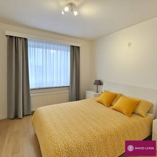 Renovated apartment with 2 rooms close to the NATO headquarters! Layout: entrance hall, living room, kitchen, storage room, 2 bedrooms,...