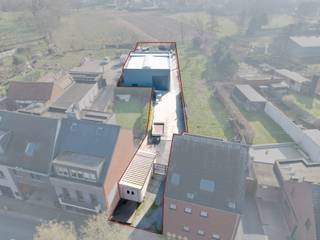 Centraal gelegen, Bouwgrond + Magazijn (144 m²) !Op een uitstekende locatie langs de Grote Baan te Herdersem, de verbindingsweg tussen Herdersem en...