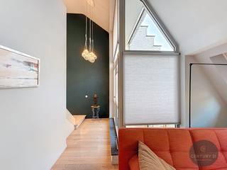 Wonen in het hart van historisch Brugge met het comfort van een luxueus appartement én de ruimte van een volwaardige woning?Dit uitzonderlijke...