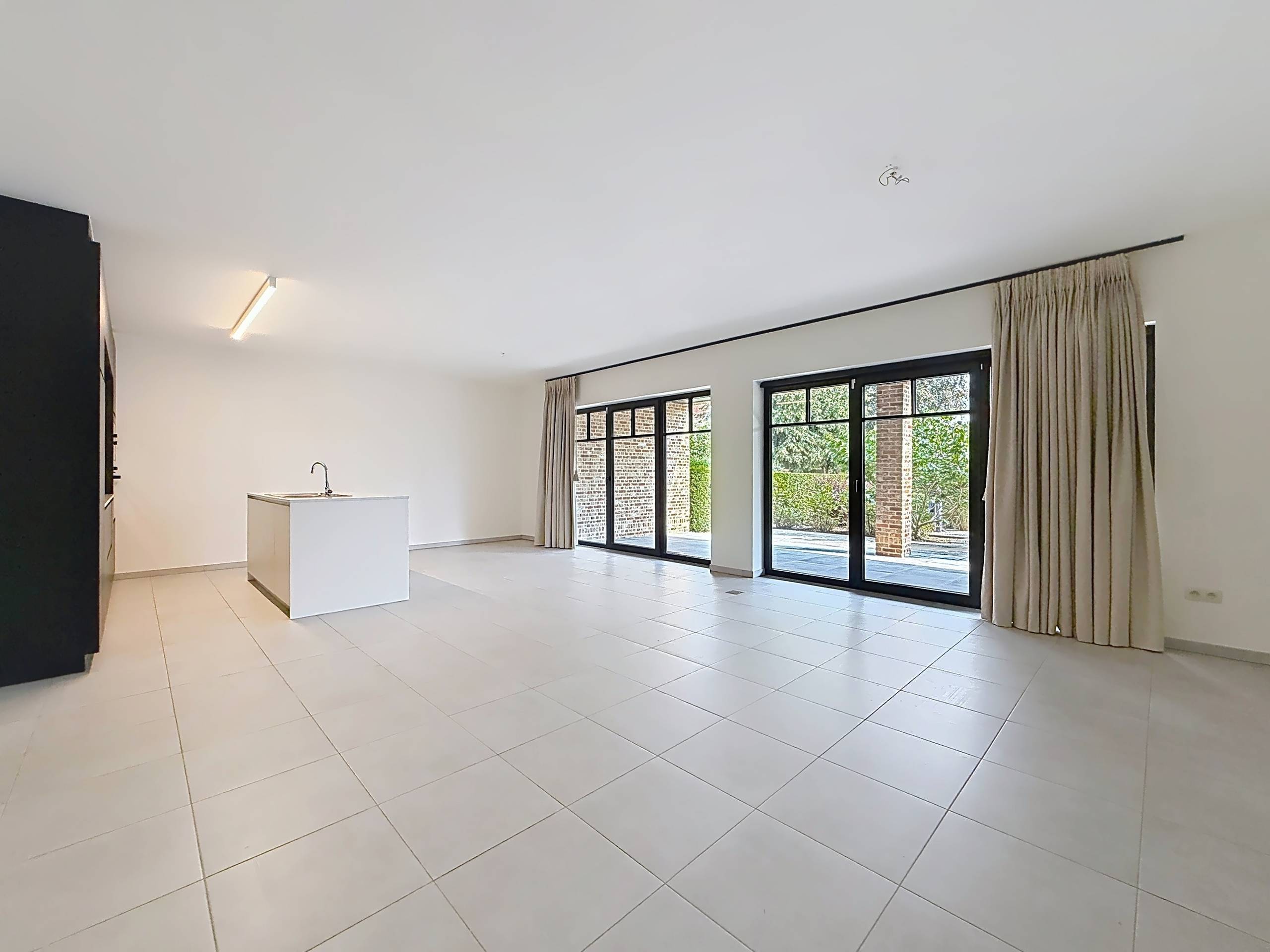 Gelijkvloers appartement met tuin in Bree - foto 5