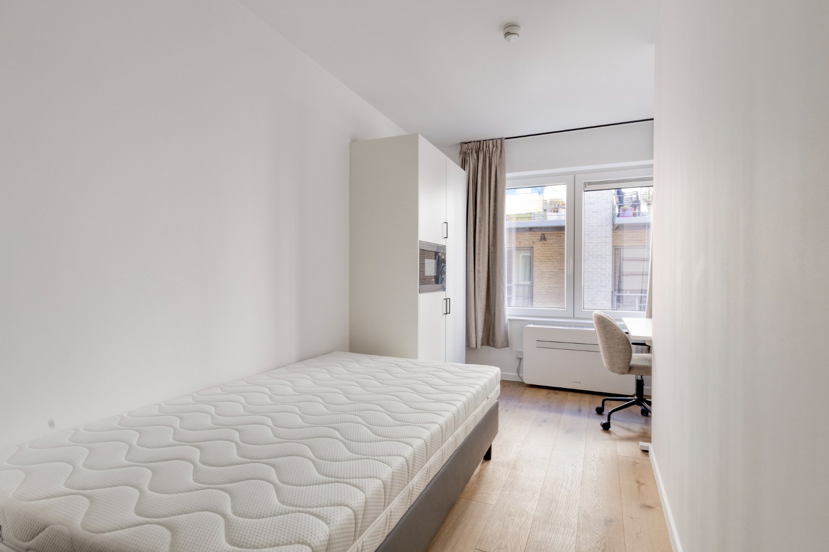 Volledig gerenoveerde studentenkamer in residentie met 15 studentenkamers en een 1slaapkamer appartement in hartje Leuven - EPC label A! - foto 5