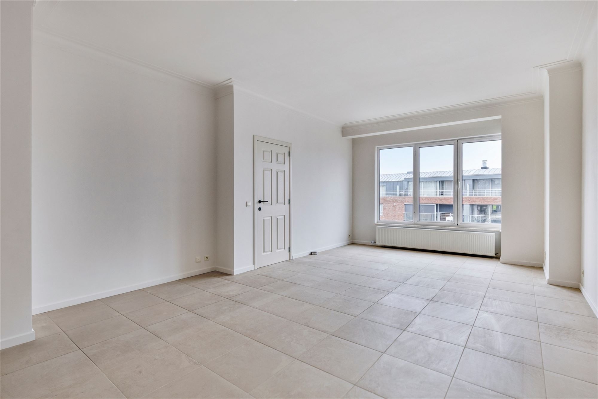 Lichtrijk appartement met terras vlakbij Harmoniepark - foto 2