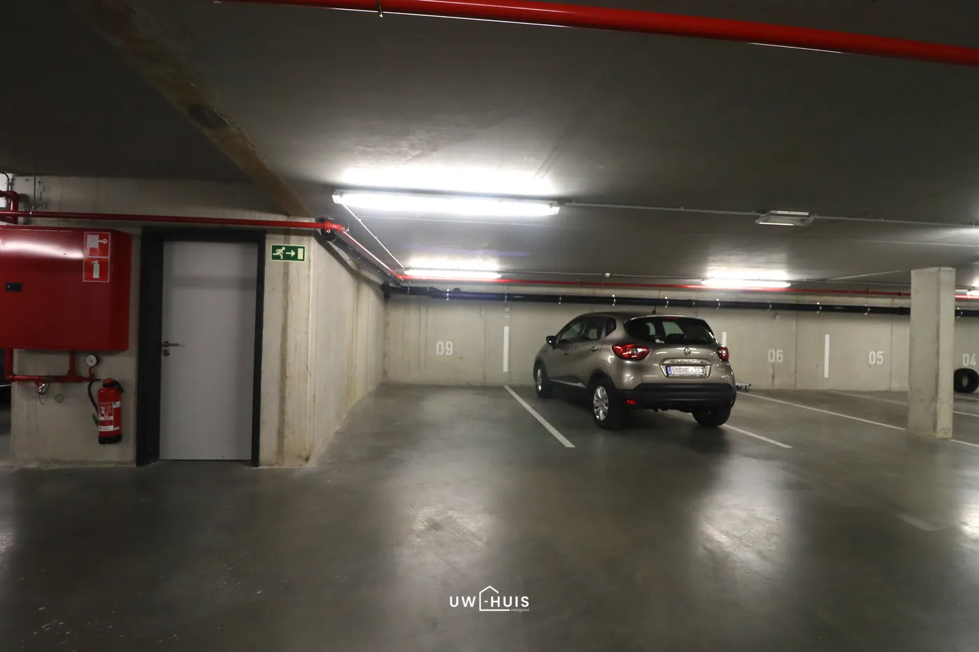 Ondergrondse autostaanplaats (beveiligd), in het centrum van Bornem - foto 4