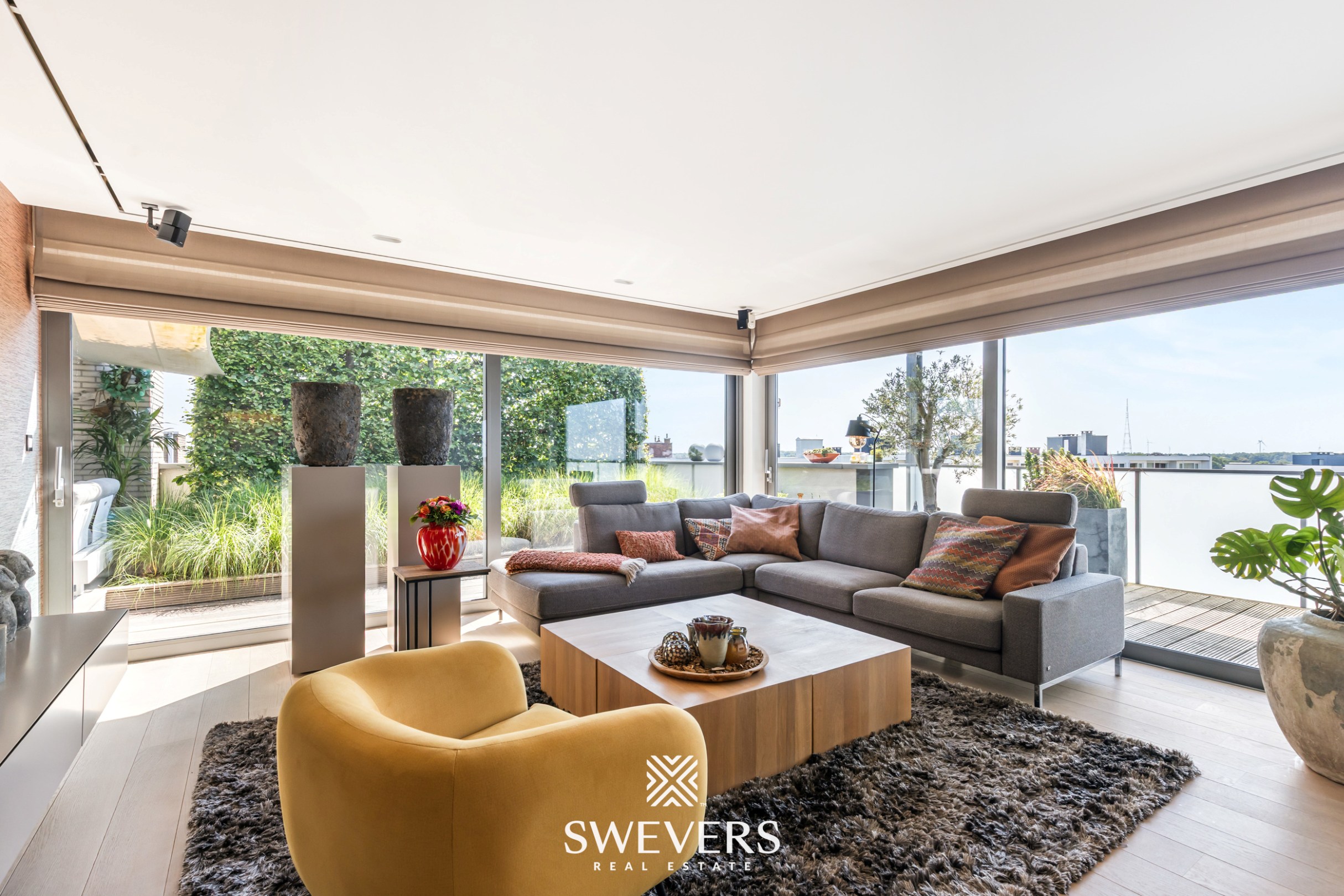 Exclusief penthouse met veel lichtinval en ruim panoramisch terras met prachtig ver uitzicht in centrum Genk - foto 4
